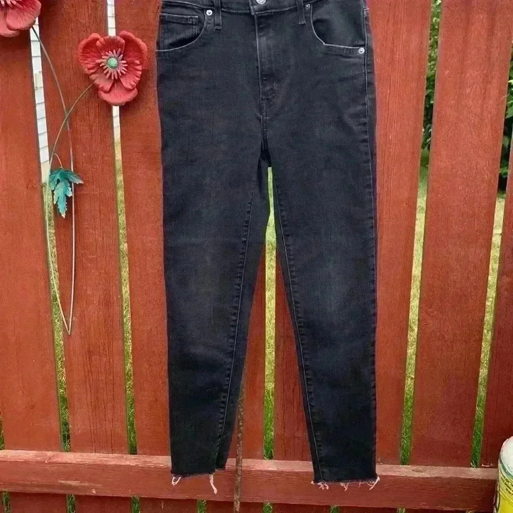 Levi’s Black Wash Mile High Super  Skinny Frayed Bottom Jeans